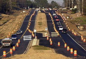 In many places, expanding roads is the government's current answer to air pollution, as a result of perverse, antiquated air-quality formulas. Photo: PB Laminations
