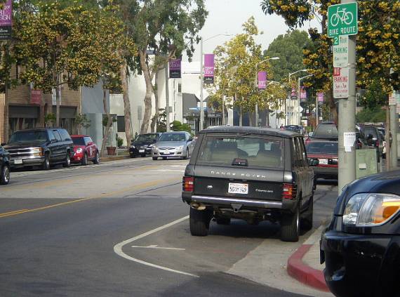 It's time to say it.  Bike route signs are next to useless, and can cause more problems than they solve as this route in West Hollywood shows.