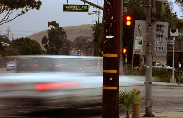 ...and being a danger to everyone. LAPD should learn the difference. Photo:##http://latimesblogs.latimes.com/comments_blog/2010/06/does-exempting-the-red-light-camera-program-from-the-boycott-make-la-city-council-hyprocrites.html?cid=6a00d8341c630a53ef013484f12fa2970c##Los Angeles Times##