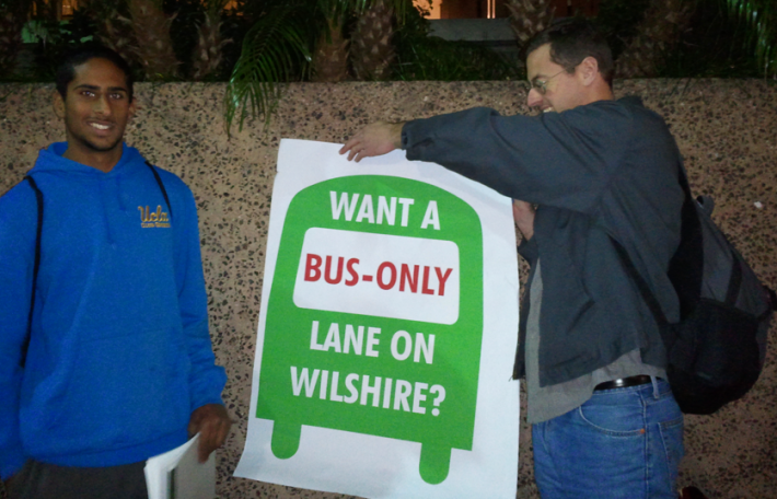 Bruins for Traffic Relief aren't above taking their views to the street. Kedar Iyer on left, Alex Schaffer right Photo: Michelle Go