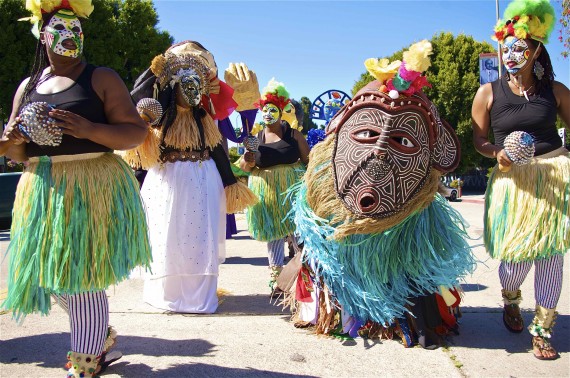 Mask festival procession in honor of the ancestors in Leimert Park. Sahra Sulaiman/Streetsblog L.A.