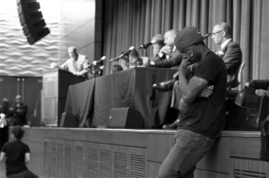 Jay Sneed (at podium) offered closing remarks at the forum at USC while Tommie Bayliss waited to speak to senior officers in person (Sahra Sulaiman/LA Streetsblog)