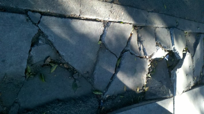 Broken sidewalk on Alameda Street in downtown Los Angeles. Photo: Roger Rudick