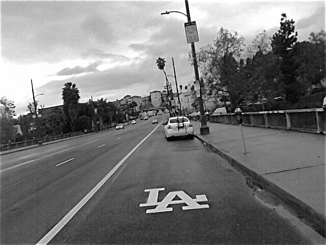 "LA" marks the spot in the peak-hour bus-only lane. Sahra Sulaiman/LA Streetsblog