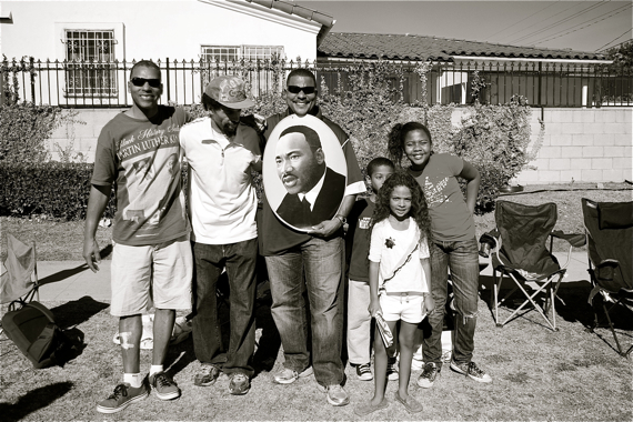 Families along Martin Luther King Blvd. celebrate at the King Day parade last year. Sahra Sulaiman/LA Streetsblog