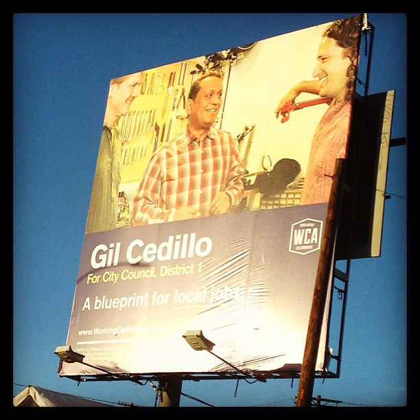 Gil Cedillo campaigned in the Flying Pigeon bike shop and used a picture with the owner in his campaign billboards. Now, Josef Bray-Ali is campaigning hard for Cedillo to fulfill a campaign promise to see bike lanes on North Figueroa Boulevard as the city's Bicycle Advisory Committee calls new studies a waste of time and money. Image: Flying Pigeon