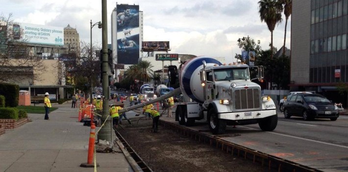Wilshire peak-hour bus-only lane project under construction last weekend. Photo from project facebook page - see below.