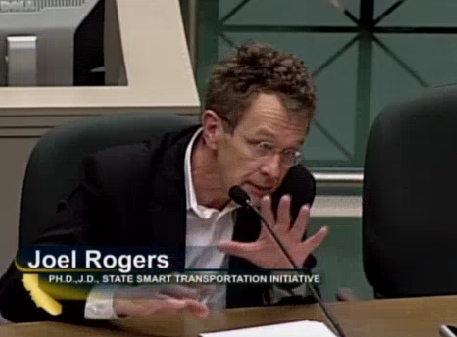 Professor Joel Rogers emphasizes a point to the Assembly Transportation Committee