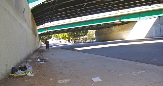 Trash accumulates under an underpass along Whittier Blvd. Sahra Sulaiman/Streetsblog L.A.