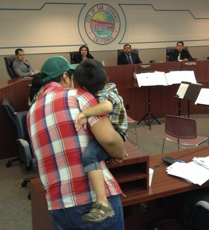 Salvador Valentin, of Bikesan@s del Valle collective, and his son Isaac testify in support of the Pacoima Wash Bikeway. The San Fernando City Council approved moving forward with pursuing state funding for the project.