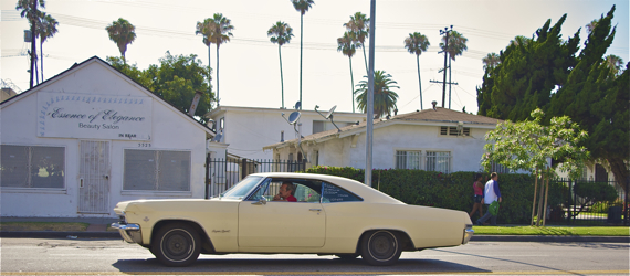 A teen walks along Western Ave. toward the Bronco Motel with a john. Sahra Sulaiman/LA Streetsblog