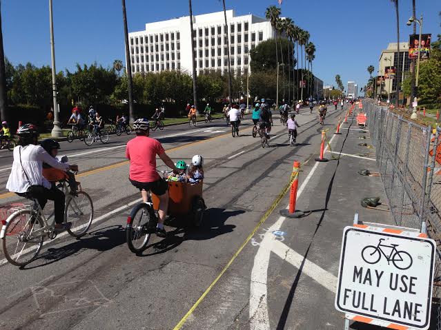 "Bikes May Use Full Lane, Damn Right." Photo and Caption: Joe Linton