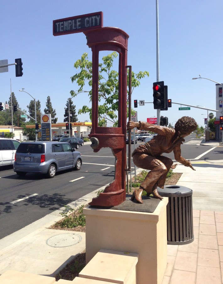 Temple City's Rosemead Blvd Project includes this sculpture of a woman riding a streetcar.