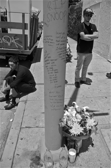 Friends and supporters leave messages on a light pole near the site where Toledo was killed. Sahra Sulaiman/Streetsblog LA