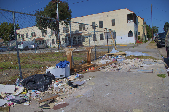 The lot at 43rd and Vermont accumulates trash. Sahra Sulaiman/Streetsblog LA