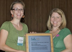 Seleta Reynolds (right) then serving as President of the Association of Pedestrian and Bicycle Professionals (APBP) giving a 2010 award to Leslie Meehan of Nashville. Photo: APBP