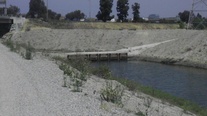 Thanks to funds collected by Metro's ExpressLanes, funding to convert this bridge and other parts of the Dominguez Channel will be converted into a bicycle and pedestrian path.and the service road that has now been funded to be converted into a similar path. This portion along the channel is currently closed. Carson and County Flood Control will work together to open it to the public for bicyclists and pedestrians. Photo: Lauren Grabowski