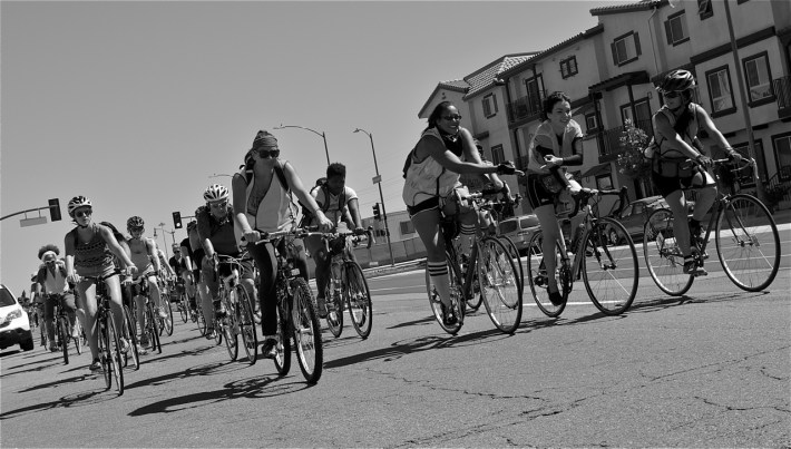 At right, Pauletta Pierce and Maryann Aguirre, organizers of and ride marshals for the event, lead women up San Fernando Rd. in Lincoln Heights. Sahra Sulaiman/Streetsblog LA