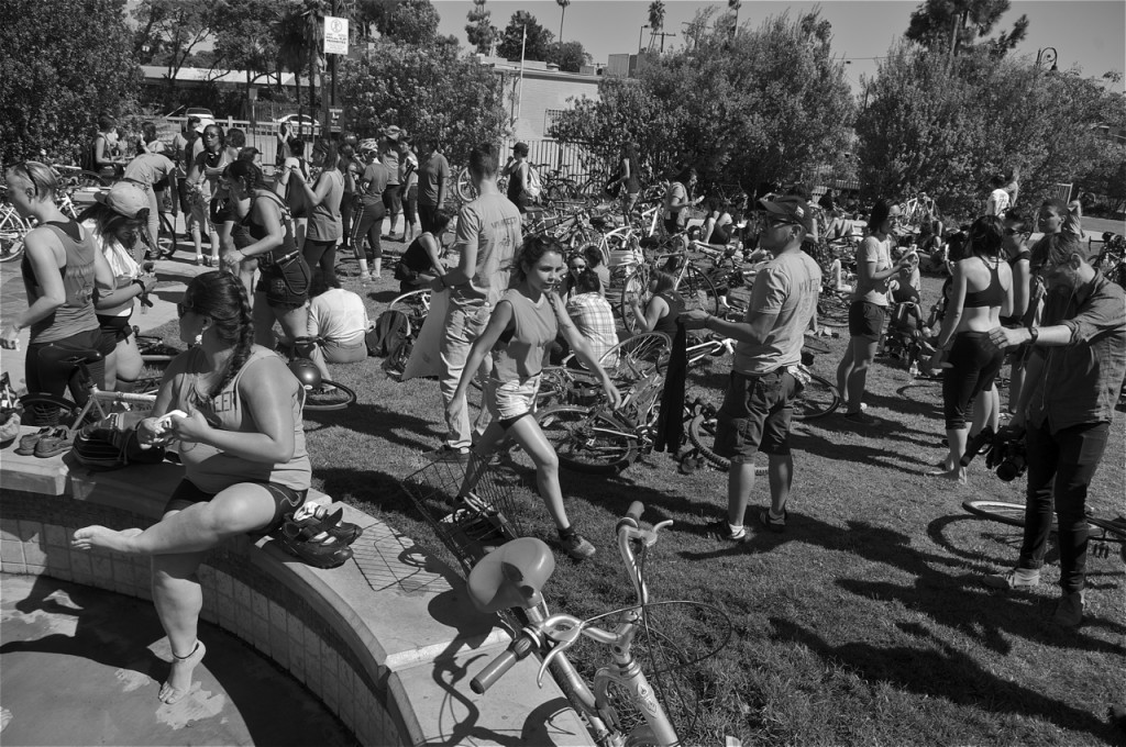 Riders rest in Glendale. A pit stop at Cerritos Park in Glendale included dancing to the beats of Buyepongo. Sahra Sulaiman/Streetsblog LA