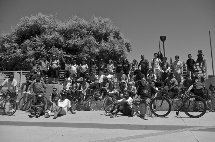 The unity riders take a break at the Watts Towers. Sahra Sulaiman/Streetsblog LA