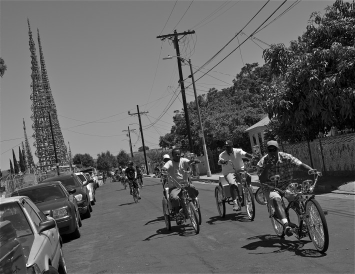 Members of the L.A. Real Rydas roll out from the Watts Towers. Sahra Sulaiman/Streetsblog LA