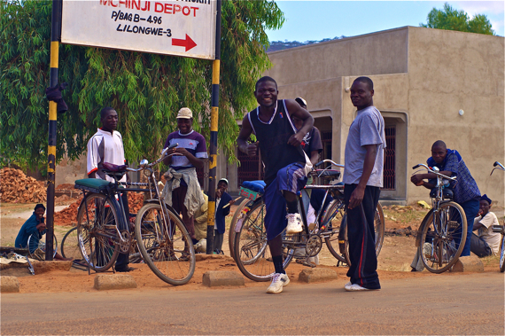 A bike repair station in Mchinji, Malawi, and a few bike taxi drivers. Sahra Sulaiman/Streetsblog LA