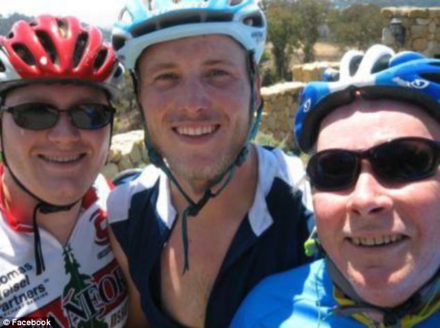 Olin is pictured in his cycling gear with sons Chris, left, and Geoff