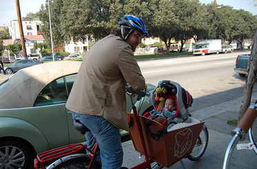When Damien and Sammy went on their first bike ride in January 2010, we knew of one other baby that was riding in a cargo bike in Greater L.A. While it's hardly mainstream, there are dozens of families using cargo bikes for kid-transportation today.