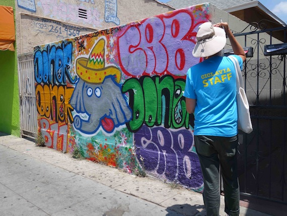 CicLAvia volunteers conduct outreach along Cesar Chavez Ave. in Boyle Heights. Erick Huerta/Streetsblog LA