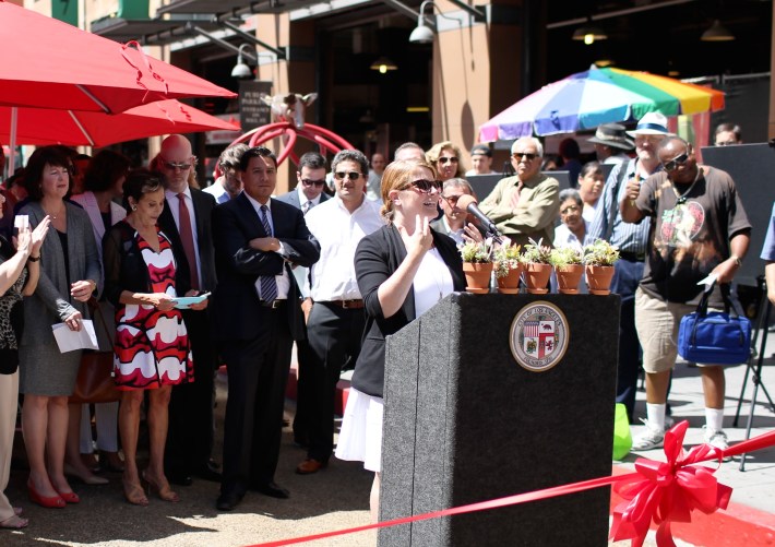 Seleta Reynolds speaks at the ribbon cutting for the "Dressed Rehearsal" on Broadway. Photo: LADOT