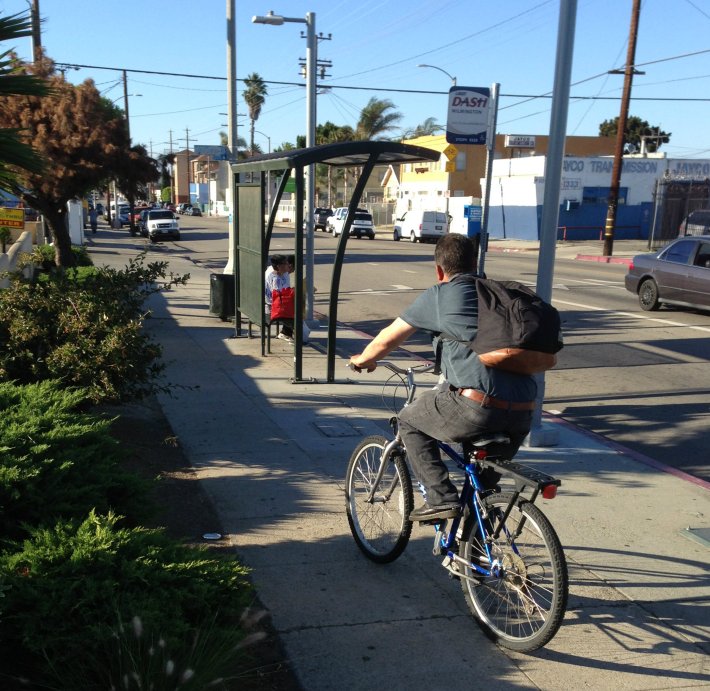 Sidewalk cyclist on Wilmington Boulevard.