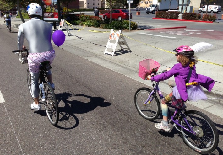 Daughter and dad dressed up at April's CicLAvia