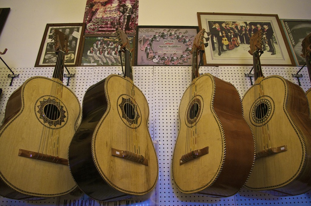 Guitarrones, a staple in a mariachi band, hang on the wall at Casa del Musico. Sahra Sulaiman/Streetsblog LA