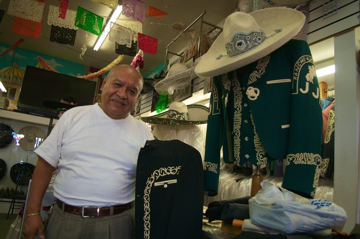 Don Jorge Tello shows off some of the detailing work he's done on jackets and sombreros. Sahra Sulaiman/Streetsblog LA