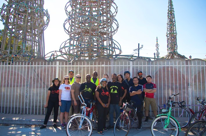 PELA members and members of the East Side Riders gather at the Watts Towers. Sahra Sulaiman/Streetsblog L.A.