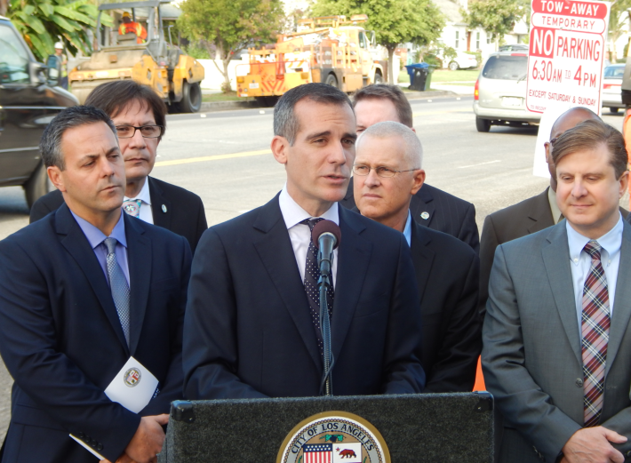 Eric Garcetti discusses street reconstruction flanked by Joe Buscaino and Mike Bonin. Photo: Damien Newton