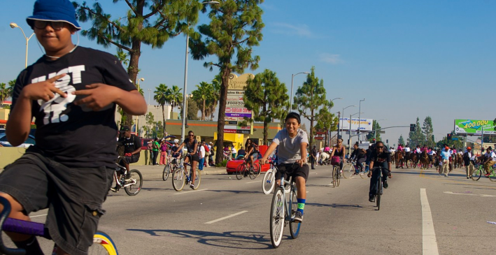 Three of the four kids that an LAPD officer claimed were supposedly causing problems during the parade and making everything a mess. In contrast, I found these kids to be incredibly sweet, experienced and knowledgeable about cycling and bike maintenance for their age, and super-excited to be able to be in the street with older riders they admired. Sahra Sulaiman/Streetsblog L.A.