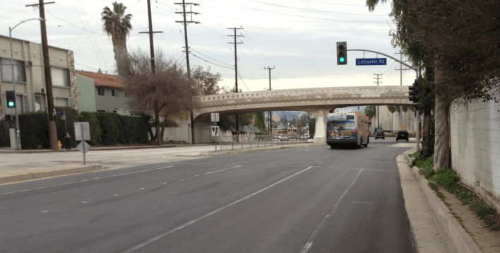 The buffered Venice Boulevard bike lanes extend from Arlington Avenue to at least Lafayette
