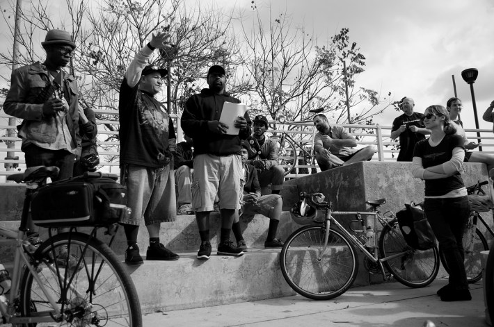 Javier "J.P." Partida speaks about the history of the Watts Towers and what they means to the community at the exploratory ride for a South L.A. CicLAvia. Sahra Sulaiman/Streetsblog L.A.