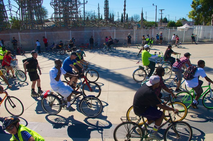 Riders circle the plaza at the Watts Towers. Sahra Sulaiman/Streetsblog L.A.
