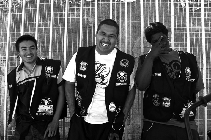 Cheech, William, and Shawn take a rest from road captain duties at the Watts Towers in 2015. Sahra Sulaiman/Streetsblog L.A.