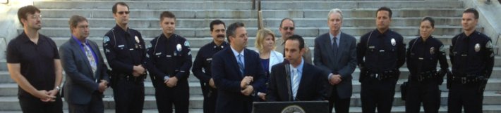 L.A. City Councilmember Mitch Englander (center, at podium) touts the city's efforts to stem hit-and-run crimes at this morning's press conference. Photo: Joe Linton/Streetsblog L.A.