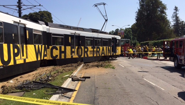 Eyes on the Street: Metro's Expo Line collided with a car and derailed last Satuday near USC.  12 people injured, one critically. Photo via Metro.