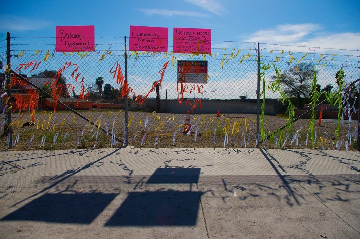 YouthBuild students contributed to an installation at a Metro-owned lot at 1st and Boyle protests the lack of a community process around the affordable housing project slated for the site. Sahra Sulaiman/Streetsblog L.A.