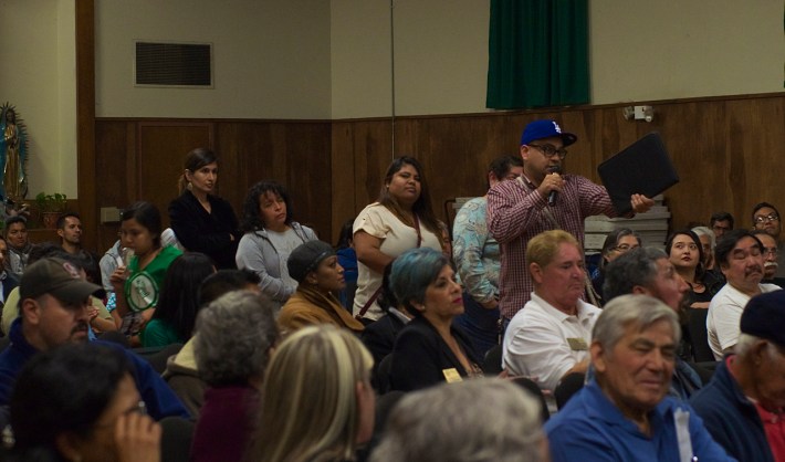 At the informational meeting on the closure of Exide Technologies' Vernon facility, Roberto Cabrales of Communities for a Better Environment asks the politicians and their staff on hand where they were over the last decade the community spent asked for their support in getting the plant shut down. Sahra Sulaiman/Streetsblog L.A.