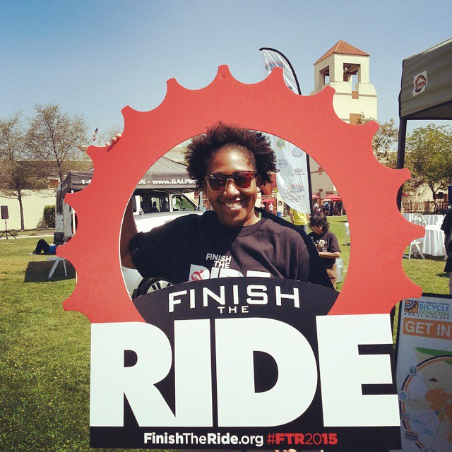 LACBC director Tamika Butler poses at Finish the Ride. Image via ##https://instagram.com/p/1qsgUQukrh/##Tamika's Instagram Feed.##
