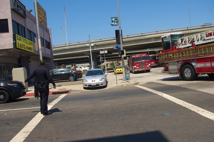 Cars are diverted to the sidewalk to get around the vehicles of the first responders. Sahra Sulaiman/Streetsblog L.A.