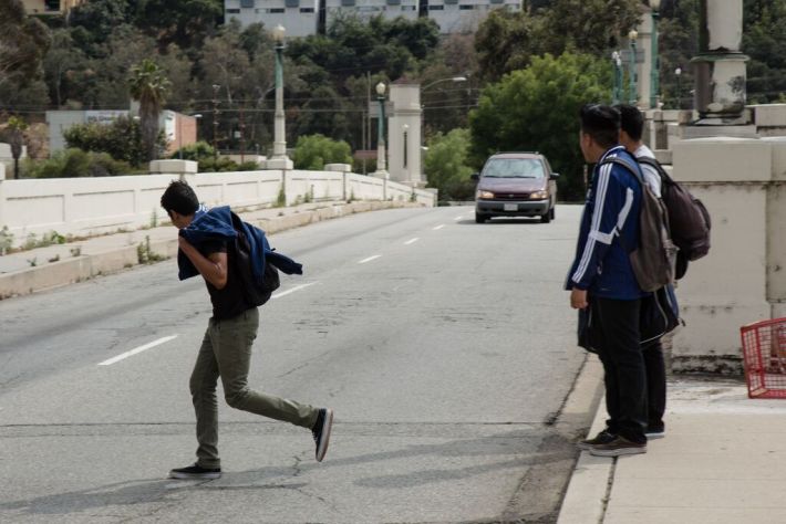 Current Glendale-Hyperion Bridge deficiencies foster unsafe pedestrian crossings, including High School students who walk to Marshall High School via the bridge. The L.A. City Council approved a design today that will remove a sidewalk from the bridge. Photo: Sean Meredith