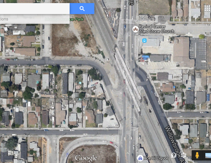 The intersection of Wilmington and Willowbrook, bisected diagonally by several sets of train tracks is a very unfriendly place for pedestrians and cyclists. (Google map screen shot)