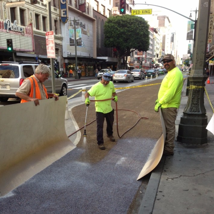 Installation of Broadway's epoxy-aggregate surface in 2014